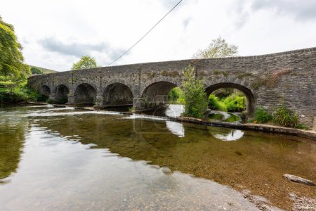 Photo of the river Barle flowing under the bridge in Withypool in Exmoor National Park