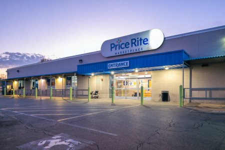 Photo for Utica, New York - Oct 24, 2023: Night Landscape View of Price Rite Marketplace Building Exterior. It is a Chain of Supermarkets that Operates in 8 States in the Northeast and Mid-Atlantic of the USA. - Royalty Free Image