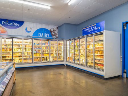 Photo for Utica, New York - Oct 24, 2023: Landscape View of the Dairy and Juice Aisle of Price Rite Marketplace. It is a Chain of Supermarkets that Operates in 8 States in the Northeast and Mid-Atlantic of the USA. - Royalty Free Image