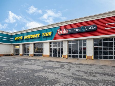 Photo for New York Mills, NY - Nov 23, 2023: Close-up of Cole Muffler & Brake Shop, was acquired by Mavis Discount Tire in 2008, expanding its services to include auto maintenance and repair besides tire sales. - Royalty Free Image
