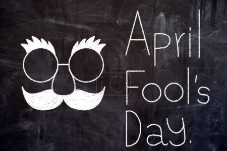 Photo for Funny Disguise Mask in Chalk Drawing Style on Blackboard, Suitable for April Fool Day, - Royalty Free Image