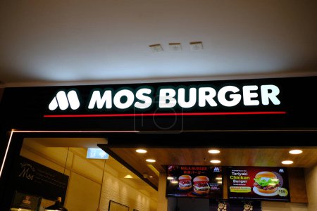 Photo for BANGKOK, THAILAND - MARCH 17, 2023: Mos Burger Sign. MOS Burger is a famous fast-food restaurant chain from Japan, Founded in July 21, 1972. - Royalty Free Image