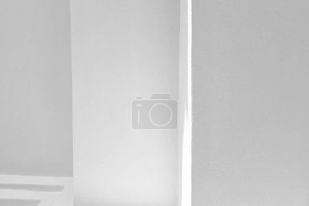 Photo for White Stucco Wall with Natural Light and Shadow Background. - Royalty Free Image