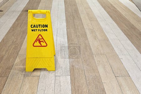 Photo for Yellow Caution Pole for Wet Floor. - Royalty Free Image