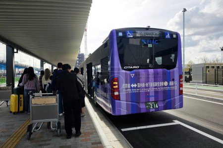 Photo for FUKUOKA, JAPAN - NOVEMBER 11, 2023: Shuttle bus INTL to Domestic, for Subway for Fukuoka Kuko station at Fukuoka Airport. - Royalty Free Image