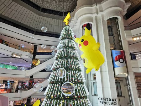 Photo for BANGKOK, THAILAND - NOVEMBER 29, 2023: Big Pokemon balloon with christmas tree at Central Pinklao. Pokemon is a Japanese anime that created in 1996 by Nintendo. - Royalty Free Image