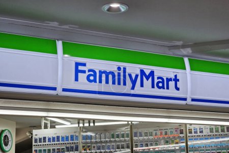 Photo for FUKUOKA, JAPAN - NOVEMBER 14, 2023: Family Mart sign. The FamilyMart Company, Ltd. is a famous Japanese convenience store franchise chain, was founded in 1973. - Royalty Free Image