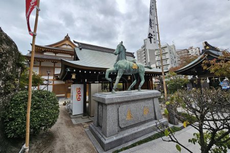Photo for FUKUOKA, JAPAN - NOVEMBER 13, 2023: Horse Statue at Kushida Jinja shrine where is a Shinto shrine located in Hakata-ku, Fukuoka, Japan, was founded in in 757. - Royalty Free Image