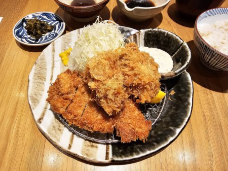 Photo for Oysters and Pork Tenderloin Tonkatsu is a famous Japanese recipe. - Royalty Free Image