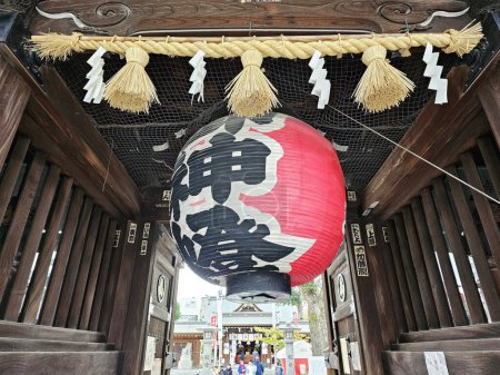 Photo for FUKUOKA, JAPAN - NOVEMBER 13, 2023: Red lantern in front of Kushida Jinja shrine is a Shinto shrine located in Hakata-ku, Fukuoka, Japan, was founded in in 757. - Royalty Free Image