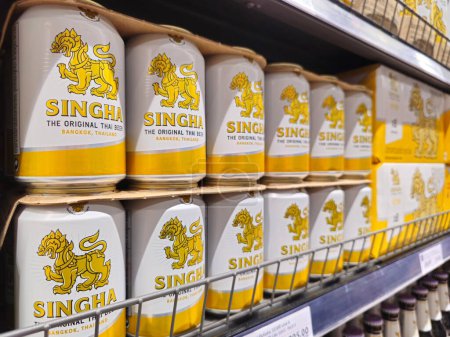 Photo for Bangkok, Thailand - March 06, 2024: Singha beer cans on shelf in supermarket. Singha is a pale lager beer manufactured in Thailand by the Singha Corporation Co. Ltd. - Royalty Free Image