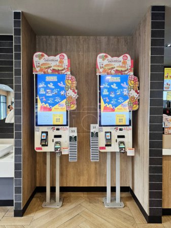 Photo for Bangkok, Thailand - February 10, 2024: Automated Ordering Systems at McDonald. McDonald was established by brother Mac in 1948. - Royalty Free Image