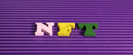 Foto de Word NFT, non-fungible token, from colored letters. Horizontal banner - Imagen libre de derechos