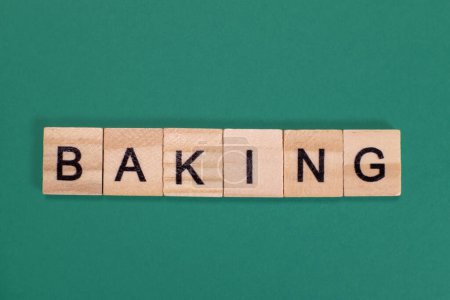 Photo for Baking word from wooden letters on green background - Royalty Free Image