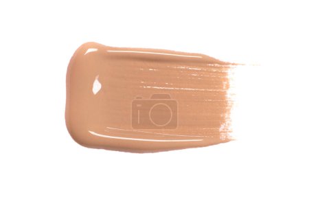 Smear of beige foundation isolated on white