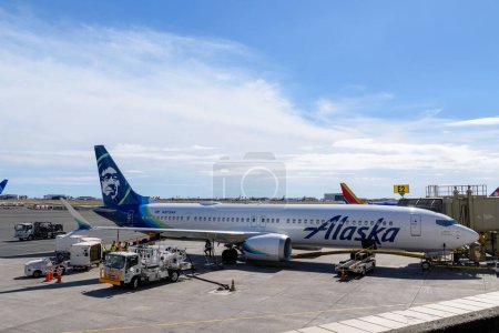 Photo for Alaska Airlines Boeing 737 MAX 9 airplane registration number N975AK parked at Daniel K. Inouye International Airport - Honolulu, Hawaii, USA - 2022 - Royalty Free Image
