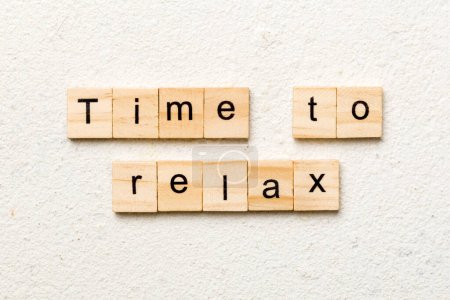 Photo for Time to relax word written on wood block. time to relax text on table, concept. - Royalty Free Image