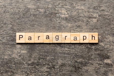 Photo for Paragraph word written on wood block. paragraph text on table, concept. - Royalty Free Image