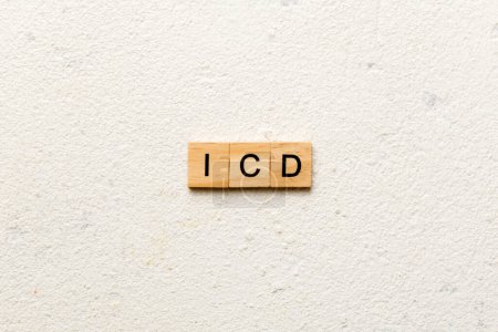 Photo for Icd word written on wood block. international classification diseases text on table, concept. - Royalty Free Image
