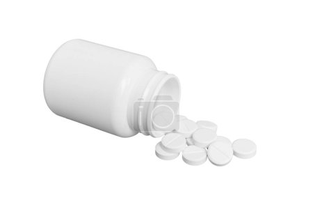 Téléchargez les photos : Les médicaments blancs coulent du récipient. médicament flacon de pilule blanche isolé sur un fond blanc. - en image libre de droit