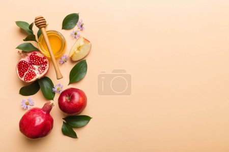 Photo for Flat lay composition with symbols jewish Rosh Hashanah holiday attributes on colored background, Rosh hashanah concept. New Year holiday Traditional. Top view with copy space. - Royalty Free Image