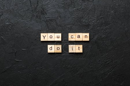 you can do it word written on wood block. you can do it text on table, concept.