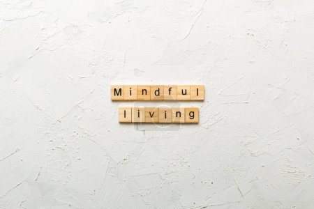 Photo for Mindful living word written on wood block. mindful living text on table, concept. - Royalty Free Image