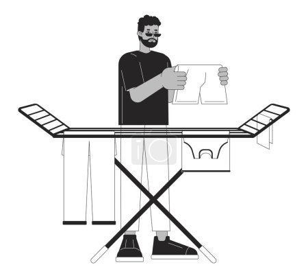 Air drying clothes on rack black and white cartoon flat illustration. African-american man 2D lineart character isolated. Home chores. Saving energy at home monochrome scene vector outline image