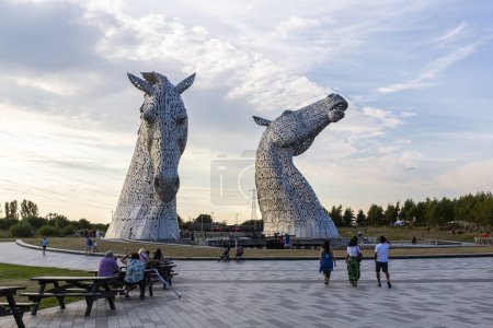 Photo for FALKIRK, SCOTHLAND 2022, August 13: The Kelpies is a 30 metre high horse head sculptures depicting kelpies, shape shifting water spirits, located between Falkirk and Grangemouth - Royalty Free Image