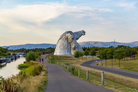 Photo for The Kelpies is a 30 metre high horse head sculptures depicting kelpies, shape shifting water spirits, located between Falkirk and Grangemouth - Royalty Free Image