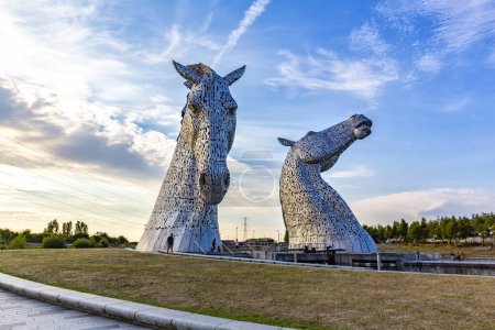 Photo for The Kelpies is a 30 metre high horse head sculptures depicting kelpies, shape shifting water spirits, located between Falkirk and Grangemouth - Royalty Free Image