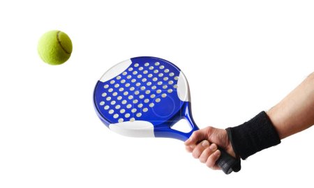 Foto de Background of hand with paddle racket hitting a ball with white isolated background.. Front view. - Imagen libre de derechos