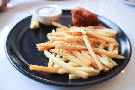 Photo for Fish and chips or fried fish and French fries for serve - Royalty Free Image