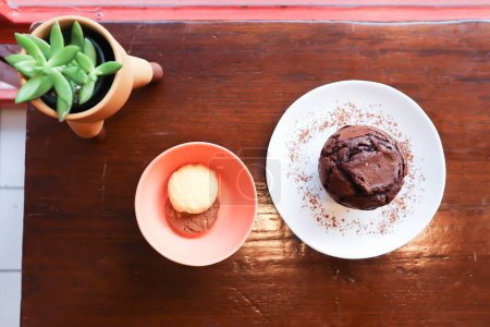 Photo for Chocolate cake or dark chocolate cake or chocolate cupcake , brownie and cookies on the table - Royalty Free Image