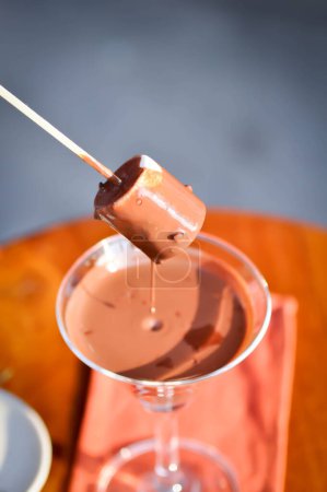 fondue,fonduta or chocolate fondue or chocolate fonduta and marshmallow for serve