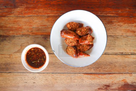 Photo for Sausage or Northern Thai sausage, sausage or spicy sausage with dip for serve - Royalty Free Image