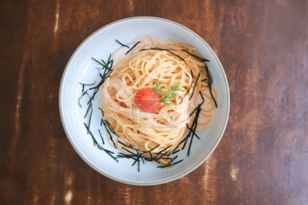 pasta or spaghetti, mentaiko cream sauce spaghetti or mentaiko cream sauce pasta with seaweed