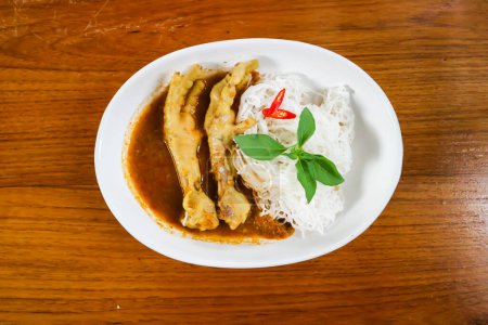 chicken curry , yellow curry chicken or chicken feet soup with rice or yellow curry soup