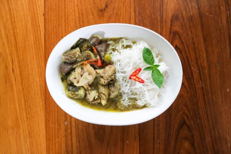 chicken curry , green curry chicken or chicken soup with vermicelli or Spicy Chicken Soup for serve