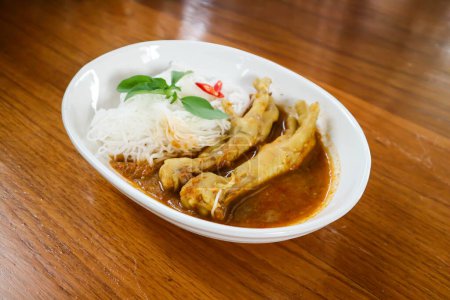 chicken curry , yellow curry chicken or chicken feet soup with rice or yellow curry soup