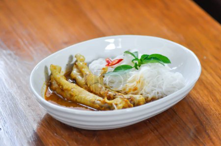 chicken curry , yellow curry chicken or chicken feet soup with vermicelli  or yellow curry soup