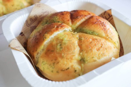 cheese bun, cream cheese garlic bread or Korean cream cheese garlic bun or cream cheese garlic bun in the paper dish for serve