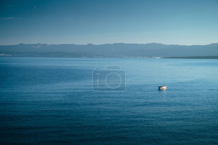 Photo for Alone Boat in clear blue Mediterranean sea. Summer Vacation photo. Edit space. - Royalty Free Image