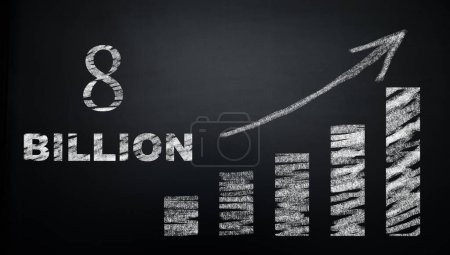 World Population Reach 8 Billion. Tittle and Graph on board. Eight Billion People on planet Earth. Big Tittle on black Board written with Chalk. Overpopulation of the planet and population growth.