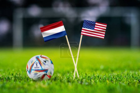 Photo for QATAR, DOHA, NOVEMBER 29. 2022: Netherlands - United States of America. Eight final, Last 16 football match. Official ball of Fifa world cup Qatar 2022 on green grass. Soccer stadium in background, - Royalty Free Image