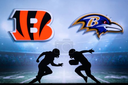 Photo for CINCINNATI, USA, JANUARY 10, 2023: Baltimore Ravens vs. Cincinnati Bengals. NFL Wild Card Round 2023, Silhouette of two NFL American Football Players against each other. Big screen in background - Royalty Free Image
