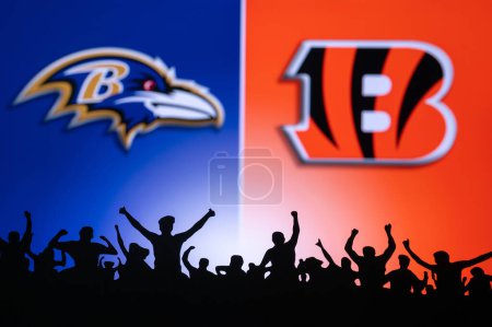 Photo for CINCINNATI, USA, JANUARY 10, 2023: Baltimore Ravens vs. Cincinnati Bengals. NFL Wild Card Round 2023, Silhouette of fans supporting the team and cheering for the players during the game. - Royalty Free Image