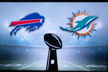 Photo for BUFFALO, USA, JANUARY 10, 2023: Miami Dolphins vs. Buffalo Bills. NFL Wild Card Round 2023, Silhouette of Vince Lombardi Trophy for the winner of National Football League. Big screen - Royalty Free Image