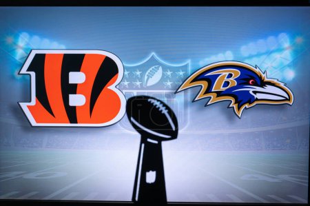Photo for CINCINNATI, USA, JANUARY 10, 2023: Baltimore Ravens vs. Cincinnati Bengals. NFL Wild Card Round 2023, Silhouette of Vince Lombardi Trophy for the winner of National Football League. Big screen - Royalty Free Image
