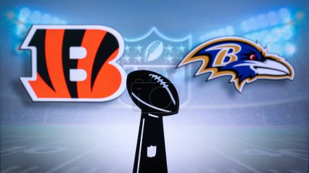 Photo for CINCINNATI, USA, JANUARY 10, 2023: Baltimore Ravens vs. Cincinnati Bengals. NFL Wild Card Round 2023, Silhouette of Vince Lombardi Trophy for the winner of National Football League. Big screen - Royalty Free Image
